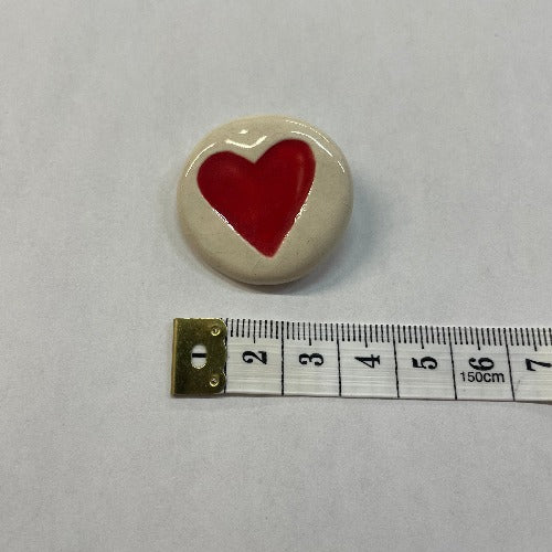 Ceramic heart buttons