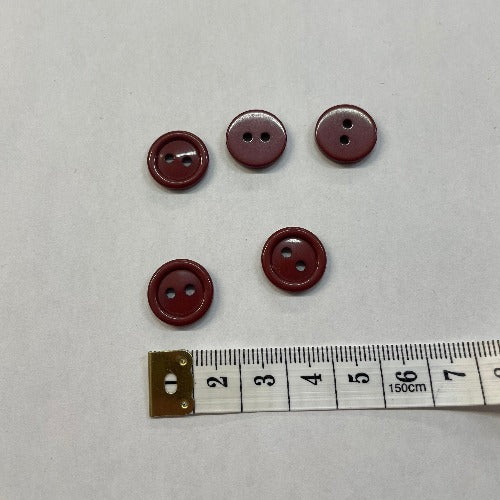 Plastic small dark terracotta buttons 15mm (1/2")