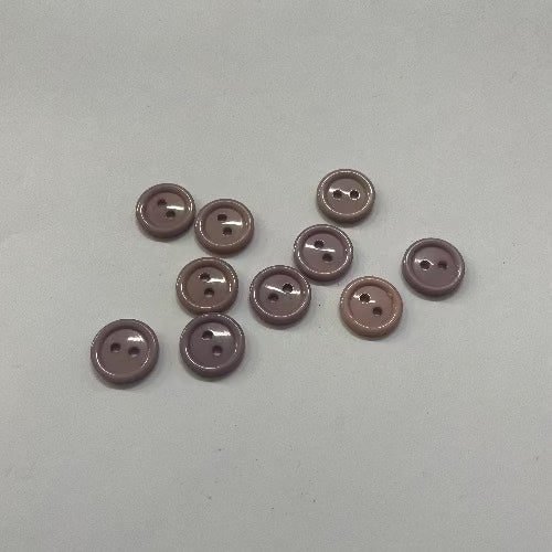 Plastic small pink/mauve buttons 14mm (1/2")