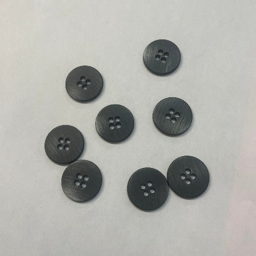 four-hole buttons in brushed metal pewter coloured