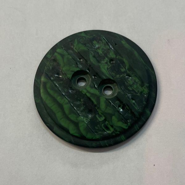 product photo of two-hole button in marbled green and black plastic