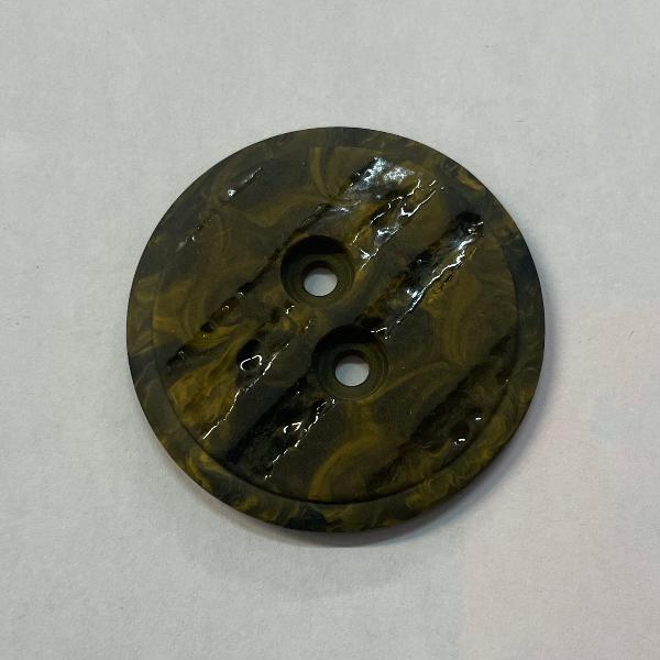 product photo of two-hole button in marbled grey and yellow plastic