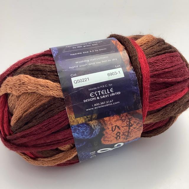 Q50221: An orange to brown and red ombré mesh yarn